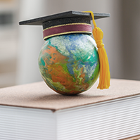 Globe with graduation cap