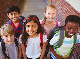 Group of happy elementary students