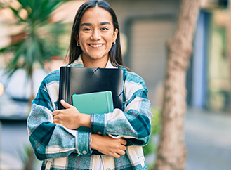 Confident Hispanic high school student ready for school